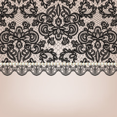 pearl necklace on lace background