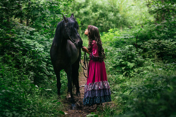 Beautiful gypsy in violet dress