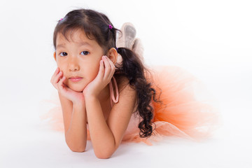 A little ballerina in the studio. On White Background