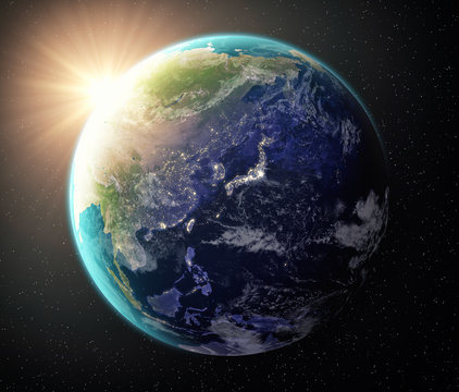 Fototapeta View of Earth and Sun from space - Japan. Some texture maps used from NASA.