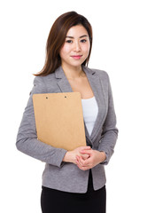 Asian businesswoman hold with clipboard