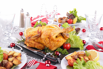 decorated table with roasted chicken