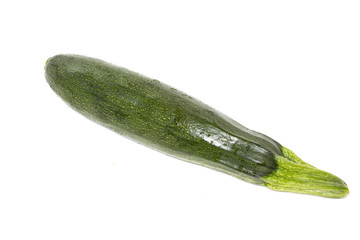 Fresh zucchini vegetable in closeup isolated on white