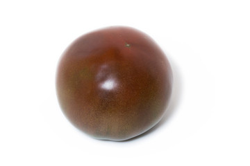 Tomato kumato isolated on white background.