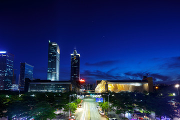 Illuminated modern skyline and buildings