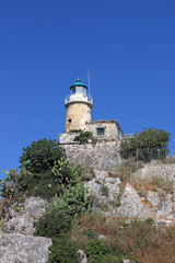Fototapeta na wymiar lighthouse old fortress Corfu Greece