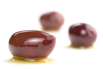 close up of kalamata olives isolated on white