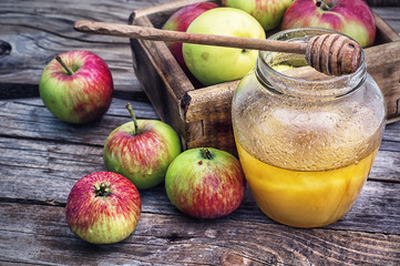 harvest of ripe apples and honey to the Church celebration of the apple feast day