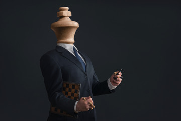 Symbol of a narcissist without head and with pawns in the hands