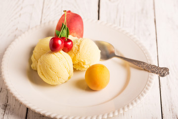 Tasty ice cream with fruits