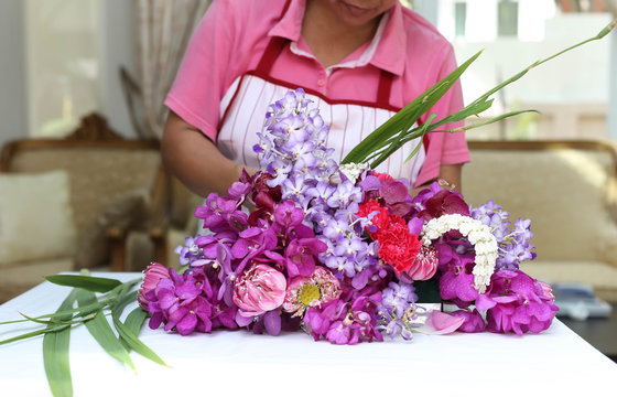 Female florist working with flowers
