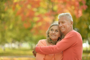  Senior couple in autumn park