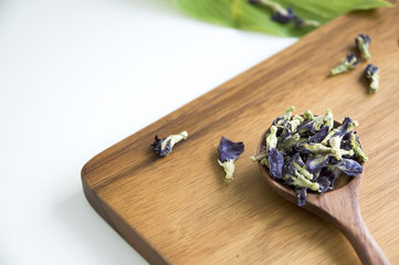 dried pea flower on cutting board