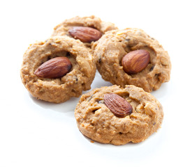Homemade almond cookies on white background