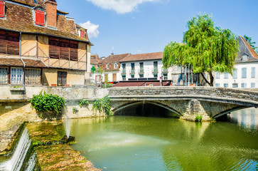 Salies-de-Bearn with an old house and a bridge.