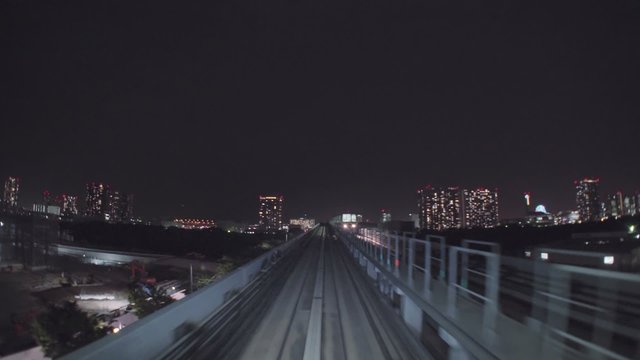 Point of view real-time ride through Tokyo via the automated guideway transit system (AGT) called the Yurikamome. No unwanted window reflections.