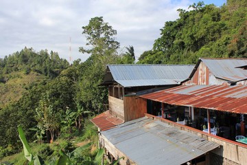 Fototapeta na wymiar Vintage Indonesian restaurant surrounded by nature in the Erotic Mountains site in Indonesia