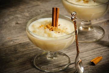Rice pudding on beautiful wooden background, selective focus