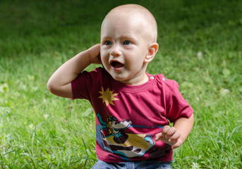 little boy talking on the phone 