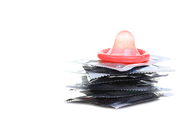 red condom on the sealed condoms