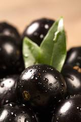 Berry Jaboticaba in bowl on wooden table