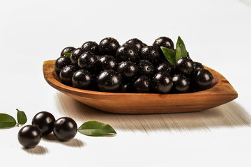 Berry Jaboticaba in bowl on white background