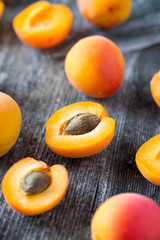 apricots on wooden surface