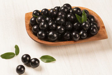 Berry Jaboticaba in bowl on white background