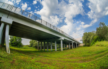 Fototapeta na wymiar bridge concrete grass green landscape nature background