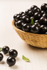 Berry Jaboticaba in bowl on white background
