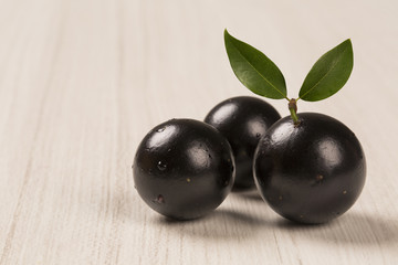 Berry Jaboticaba in bowl on white background