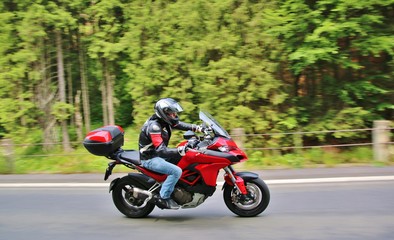 Fototapeta na wymiar Motorcycle on the rural road