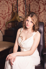 Fototapeta premium beautiful girl on a background of retro interior
