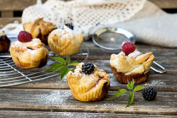 Raspberry and blackberry pies with chocolate