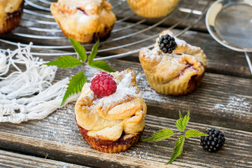 Raspberry and blackberry pies with chocolate