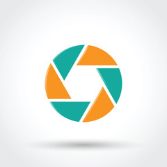 Camera shutter symbol.