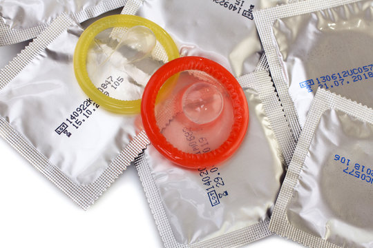 two open condoms  and sealed condoms