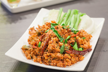 Thai cuisine spicy crispy pork salad, Larb