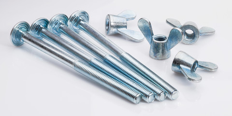 Group of screw-bolts on white background.