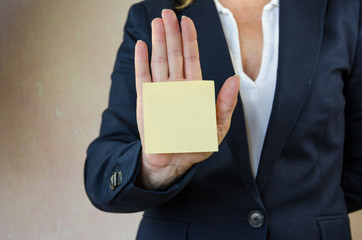 hand with postit sticker