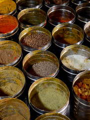Food condiments in round dishes.