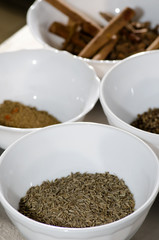 Food condiments in round dishes.