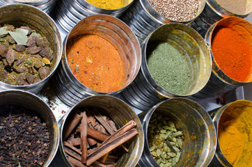 Food condiments in round dishes.