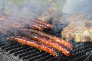 Pork meat on a grill.