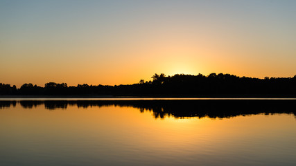 symmetric reflections on calm lake