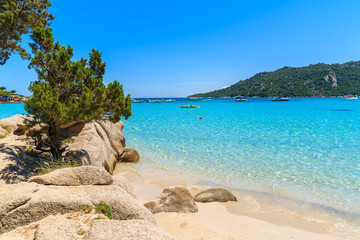 Crystal clear turquoise sea water of Santa Giulia beach, Corsica island, France
