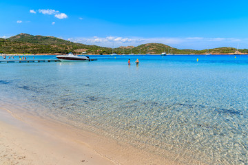 Fototapeta na wymiar Crystal clear sea water of Santa Giulia beach, Corsica island, France