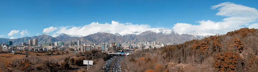 Foto auf Glas Panorama of Tehran Skyline with Alborz Mountains and Jungles Surrounding the Buildings © Borna_Mir