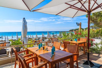 Cercles muraux Plage de Palombaggia, Corse Restaurant tables on Palombaggia beach, southern Corsica island, France