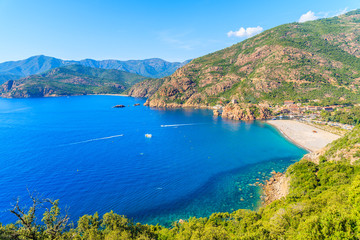 Fototapeta premium Beautiful bay with azure sea water in Porto town, Corsica island, France